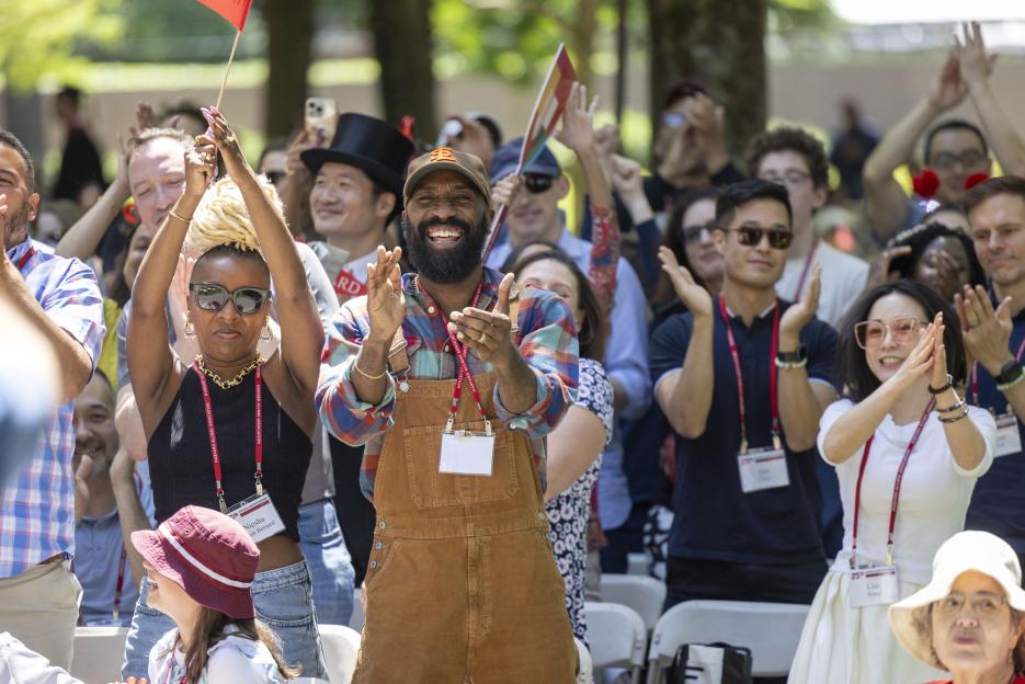 Members of the class of 1999 react to Chief Marshal, Baratunde Thurston '99 on Alumni Day, 2024.