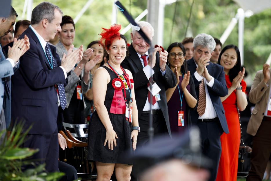 2025 Chief Marshal of the Alumni, Dara Olmsted Silverstein AB ’00, is recognized during Harvard Alumni Day.