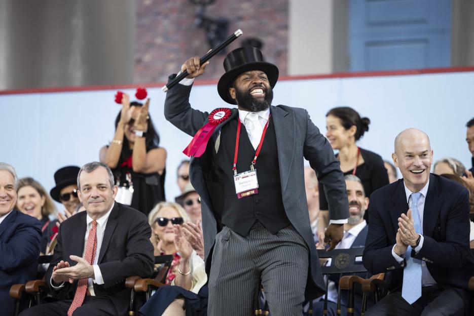 2024 Chief Marshal of the Alumni, Baratunde Thurston '99, reacts to his classmates in the crowd during Alumni Day.