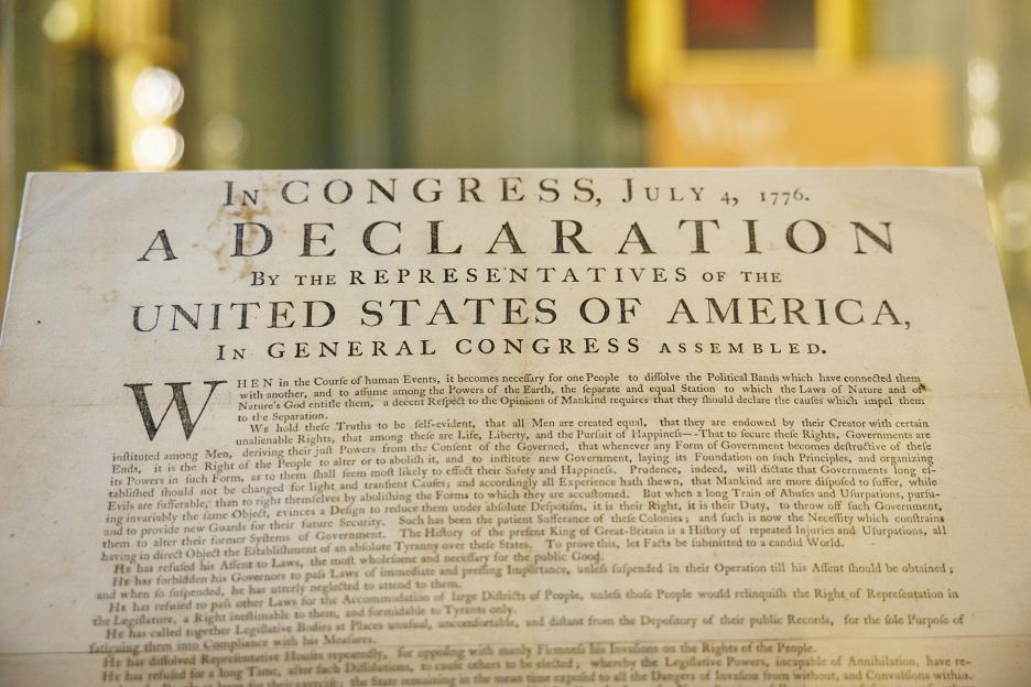 One of the first copies of the Declaration of Independence on display at Harvard.