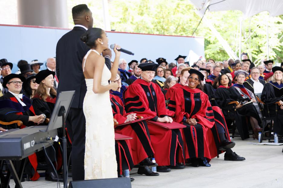 Audra McDonald reacts to a surprise musical performance of “Wheels of a Dream.”